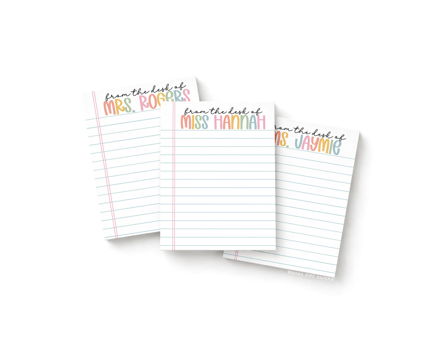 Three small notepads with notebook paper background. There are personalized names at the top of each notepad in bolder pastel rainbow text with "from the desk of" in black cursive above the rainbow pastel text.